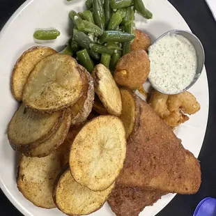 Fried cod, Hushpuppies, belly fries, fried shrimp, and green beans.