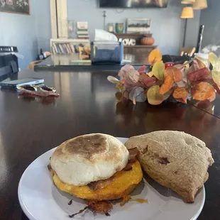 Breakfast Sandwich (bacon) and the white chocolate raspberry scone
