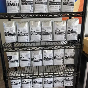 a rack of coffee bags