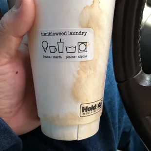 Coffee fell everywhere because it was overfilled