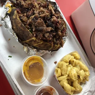 Big Bertha Potato with brisket and a side of Mac and cheese.