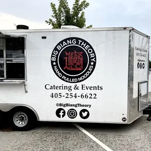 a food truck parked in a parking lot