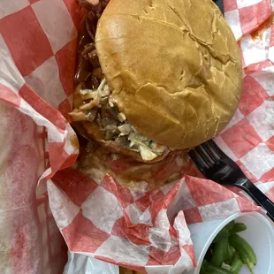 Great place, yummy brisket sandwich with slaw &amp; sauce, fork worthy! Side of green beans. Hubs had catfish, gone in a flash