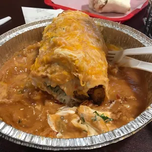 Spicy, smothered chicken burrito