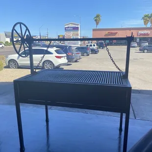 a grill in a parking lot