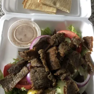 Expensive but tasty Greek Salad with gyro. They charge extra for Pita Bread and tzatziki sauce.