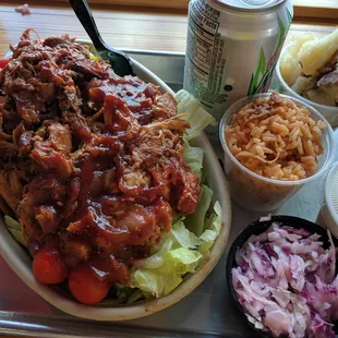 Pulled BBQ chicken salad with BBQ rice, slaw, and rosemary potatoes for $10. I could only eat half of it! Delicious!!