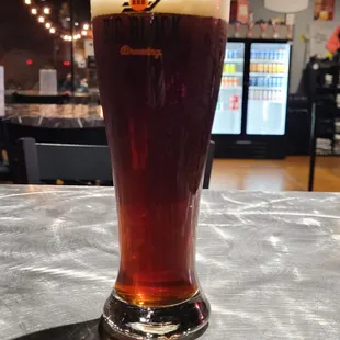 a tall glass of beer