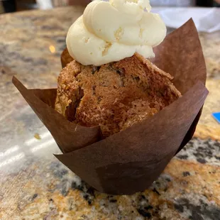 Zucchini muffin with frosting