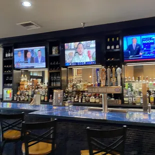 a bar with televisions