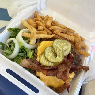 Plate-sized bacon cheeseburger!! Crinkle fries seasoned to perfection!