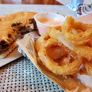 Double cheeseburger with onion rings and Big Boy sauce for both