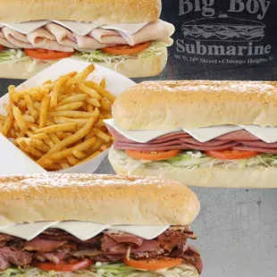 three sub sandwiches and french fries