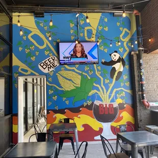 Outdoor seating &amp; super cool funky mural