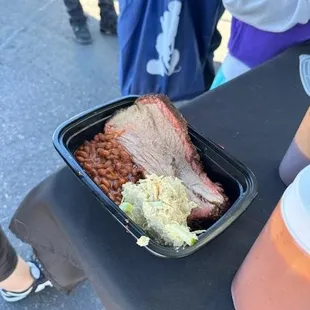 a plate of meat and beans