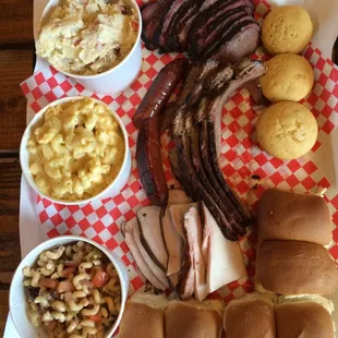 3 sides, almost every meat they have to offer, corn bread, and baby buns to build our own sliders