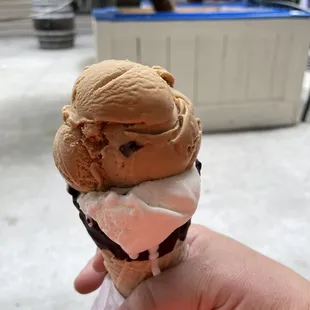 hand holding ice cream cone