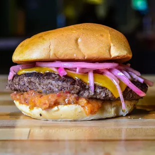 The Collaboration // Angus beef sautéed in duck butter, Cheddar cheese, bacon jam, pickled red onions