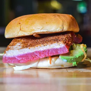 The Curious Craiggers // Sushi-grade Ahi Tuna brushed with sweet Thai chili sauce, Asian slaw, pickled ginger, avocado, wasabi aioli