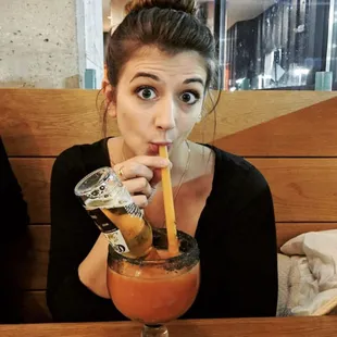 The Good Caus'arita -- Frozen blood orange 'strongarita' with an upside down coronita