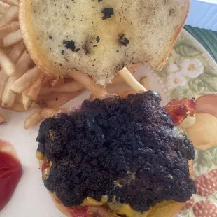 My burger is burnt  if I wasn&apos;t starving it probably wouldn&apos;t taste so good