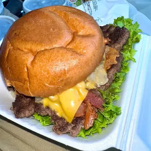 Classic w/bacon. Bun, veggies, bacon, and crisp pickles GREAT.  Hamburger patty was very dry.