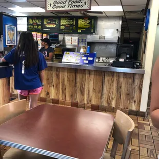  woman standing at the counter