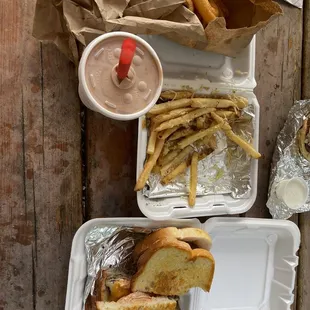 Sourdough bacon burger, garlic parm fries, onion rings, chocolate shake
