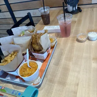 Order - 2 combos - one spicy sandwich and one popcorn chicken and a kids chicken tender meal