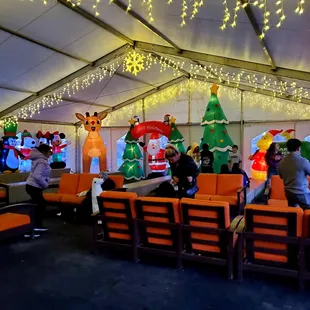 Seats inside the shoe rental part of the place