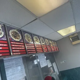 menus on the wall of a restaurant
