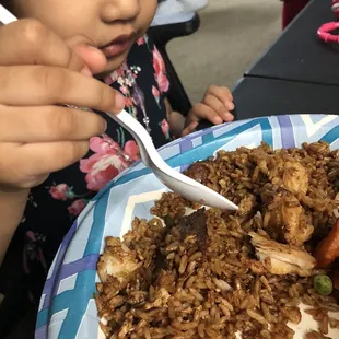 She's enjoying the fried rice