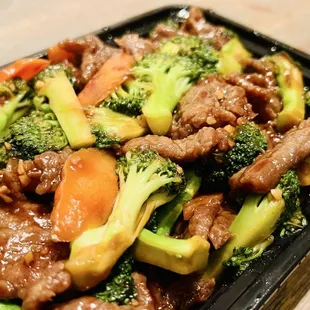 Beef Broccoli. Tender beef and crunchy broccoli. Great flavors and generous portion size!