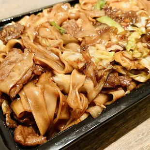 Beef Chow Fun. It reminded me of pad see ew; flat noodles with chunks of tender beef, cabbage, and onions.