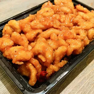 Orange Chicken. Thick battered chunks of chicken and glazed in a sweet, tangy, citrusy sauce. I liked it.