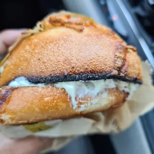 Cheesy hashbrown bagel with onion and chive schmear