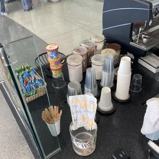 a coffee machine and coffee cups