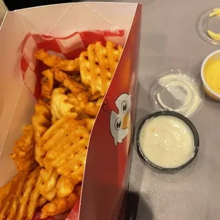 Seasoned waffle fries and cheese