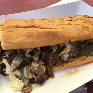Nice  Big City Cheese Steak with cheese, peppers, onions and and mushrooms. Reminds me of a po-boy sandwich from New Orleans m.