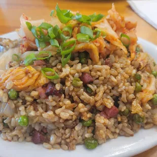 Grandma&apos;s kimchi fried rice with pork, sausage, chicken. Excellent