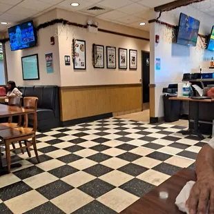 a man cleaning the floor