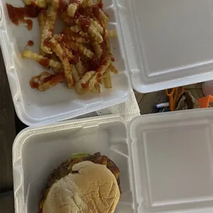 Double Cheddar Bacon Double Burger (1/2lb) and fries.