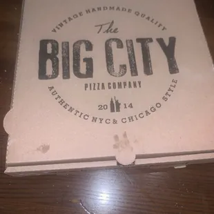 a pizza box on a table