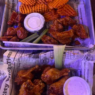 Yummy wings and sweet potato waffle fries