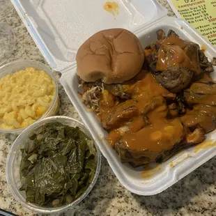 Meat Sampler (BBQ pork sandwich, bbq ribs, bbq chicken) Side collard greens and Mac and cheese.