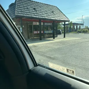 a man standing in front of a store