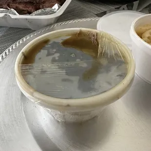 a bowl of soup and a plate of food