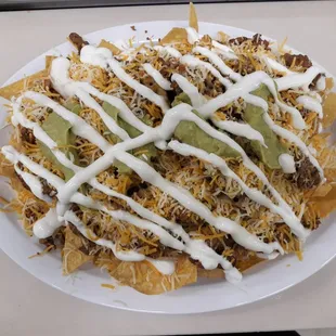 This is our New Plate at Big Daddy's***CARNE ASADA NACHOS WITH CHORIZO***