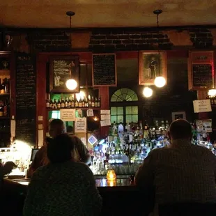 people sitting at the bar