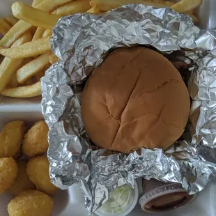 Chicken BBQ sandwich, corn fritters, and seasoned fries.